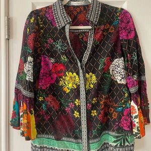 Alice + Olivia vibrant floral blouse.